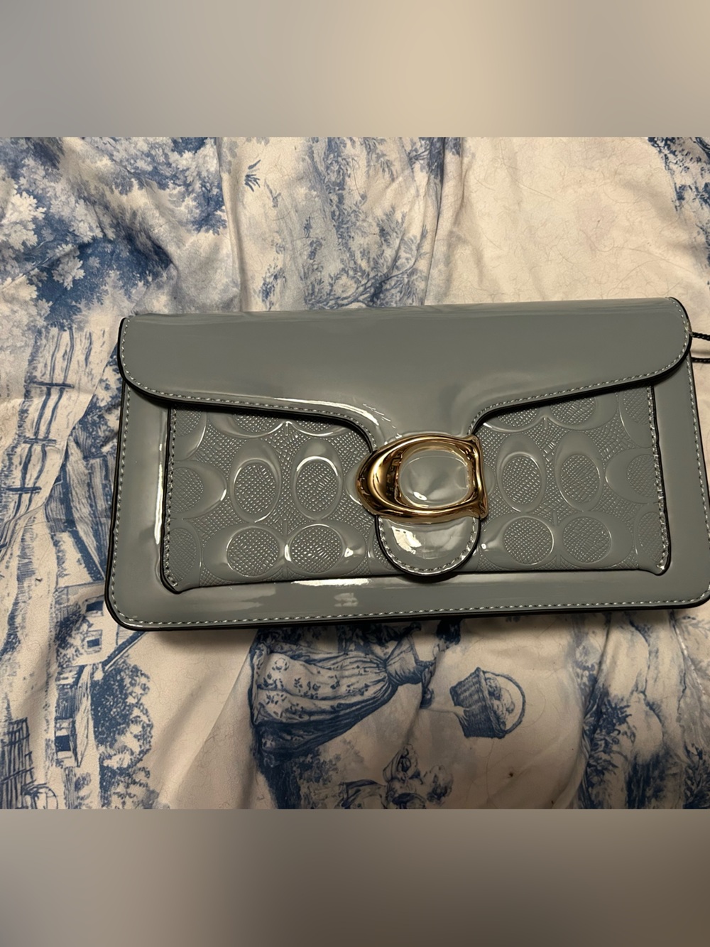 Glossy Blue Patent Leather Clutch with Gold-Tone Buckle